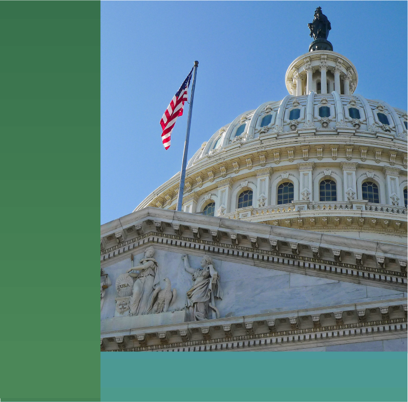 photo of the United States capitol building where the viewer is looking up at the east front facade towards the Rotunda.